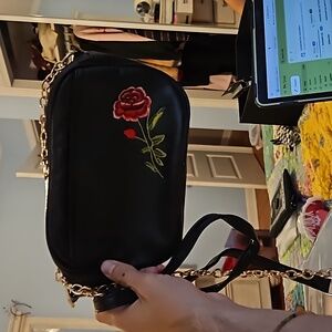 Black faux leather purse with rose